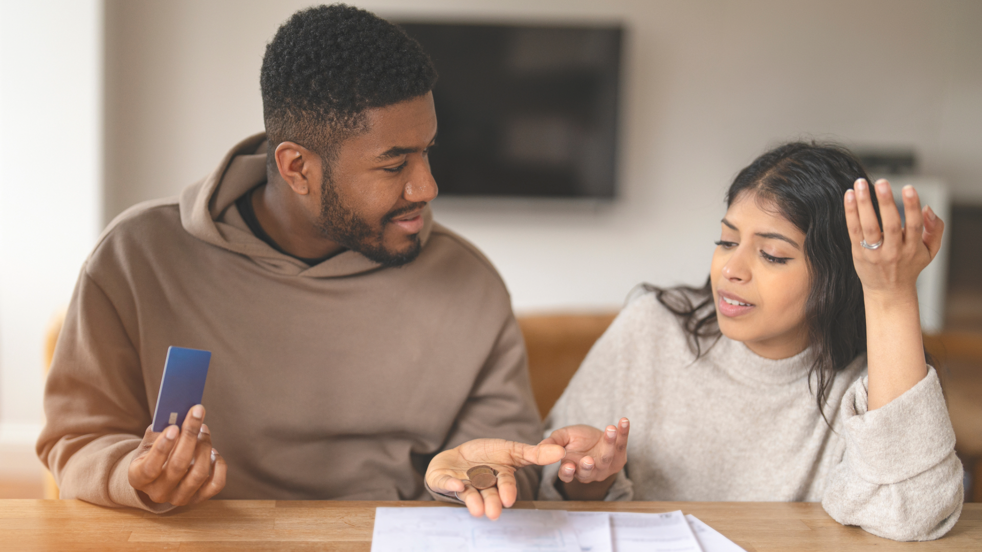 Couple working on their financial budget together.