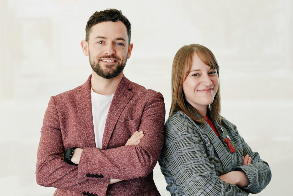 Photo of GenNEXT GenNEXT Co-Chairs Brett Eigner & Natalie Steffl posing side by side.